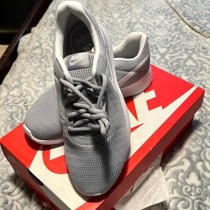 Woman Nike Tanjun wide size 8.5 white and gray.  Brand new with box
